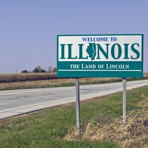 the welcome to Illinois state highway sign with a tagline of the land of lincoln
