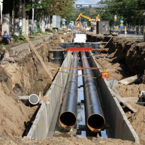 Replacement pipes in the city. Construction of heating mains for municipal infrastructure, the concept of development.