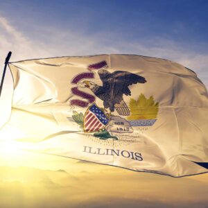 Illinois state of United States flag waving on the top sunrise mist fog