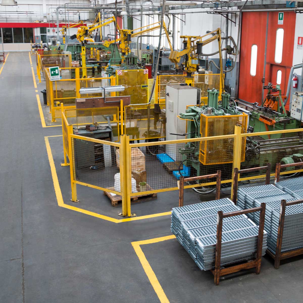 picture of a manufacturing floor with equipment and technology