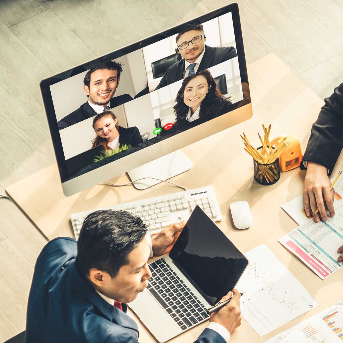 Video call group business people meeting on virtual workplace or remote office. Telework conference call using smart video technology to communicate colleague in professional not-for-profit organization