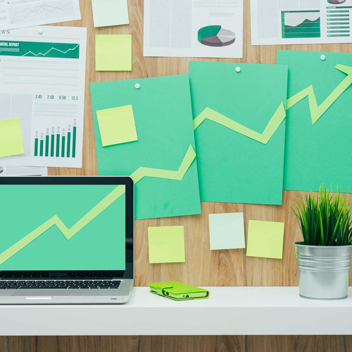 an illustration of financial growth; chart imagery where growth is displayed; green background image