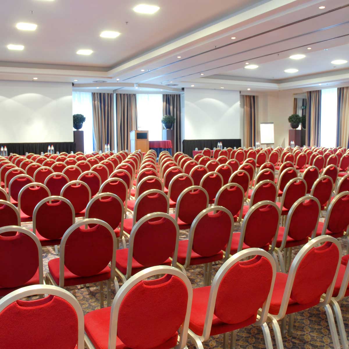 auditorium-and-banquet-event-hall-with-rows-of-chairs-for-guests