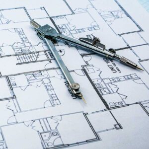 Office blue print with drawing compass and ruler