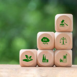Wooden-block-with-environmental-icons.-Concept-of-international-environmental-protection,-environmental-impact-assessment,-business-corporate-and-industry